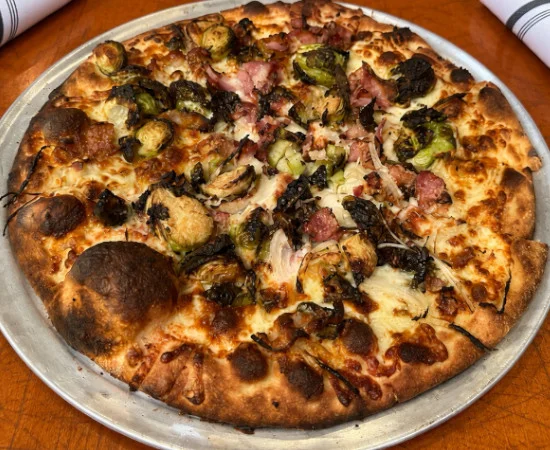 Eddie V pizza at Christos