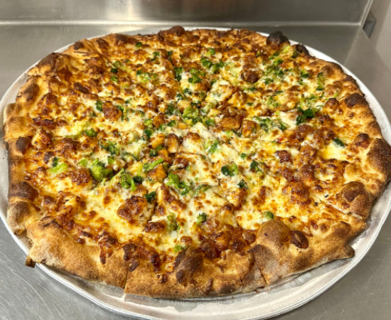 General Tso’s Chicken pizza at Christos